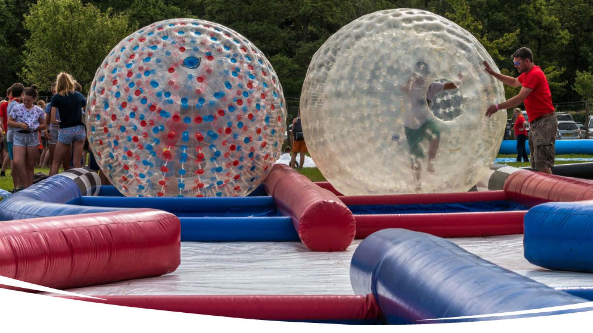 Picture of two scouts in zorb balls